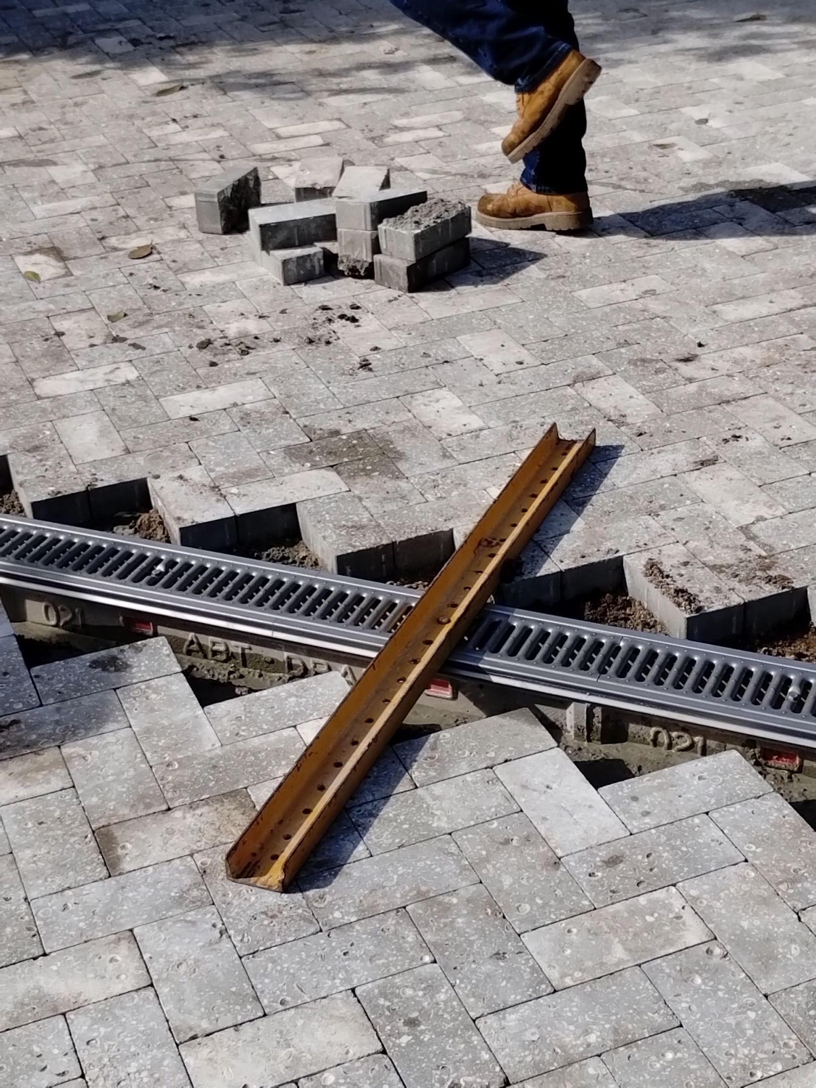 driveway trench drain being installed in west palm beach